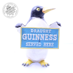 65698040_Guinness_Penguin_Wooden_Figurine-1.jpg